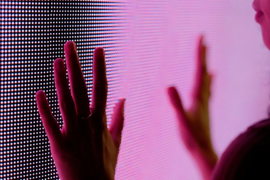 Hand, touch and digital with screen, interaction and modern multimedia kiosk for information