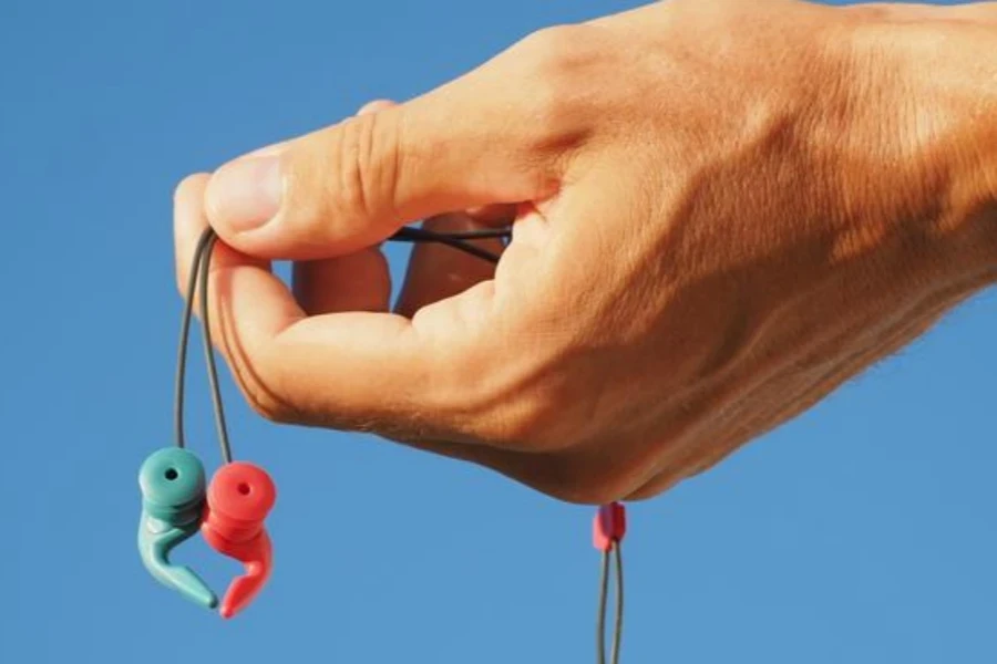 Handheld ear protection plugs for swimming