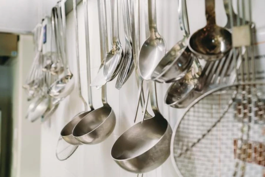 Hanging ladles in a professional restaurant's kitchen