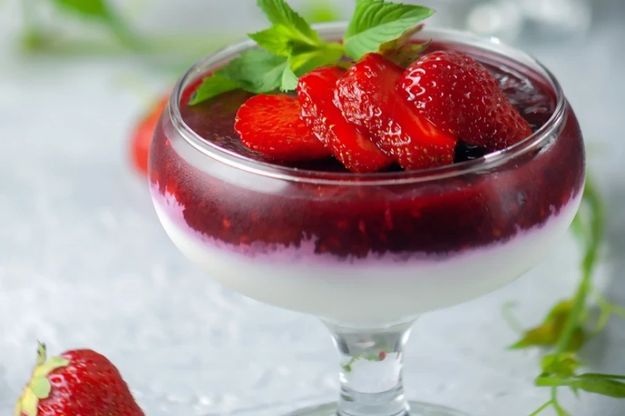 Italian vanilla strawberry dessert in a glass trifle bowl