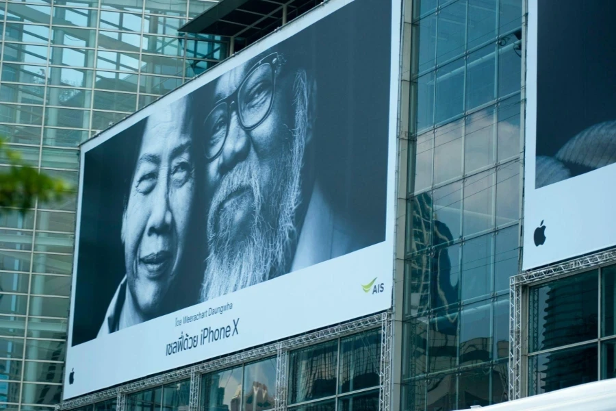 Man Beside Woman Billboard