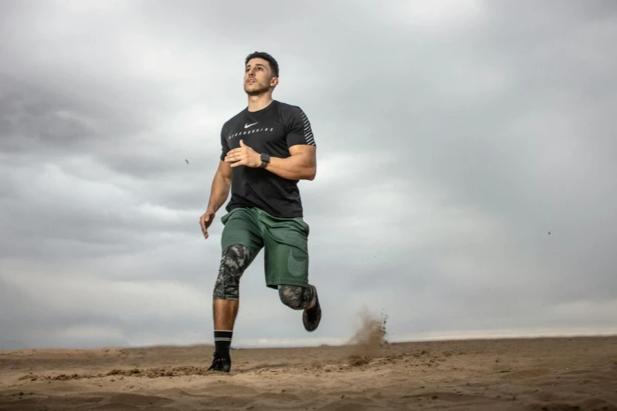 Man Running on Sand Field