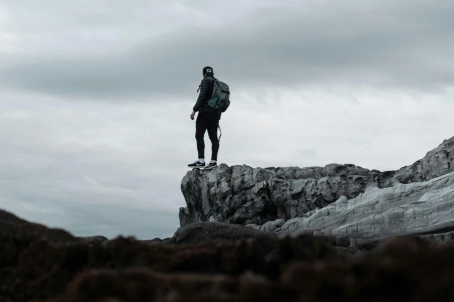 Man Standing on the End of the Rock