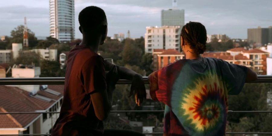Man and Woman Looking at City Buildings