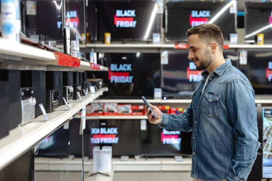 Man checking out black Friday offers