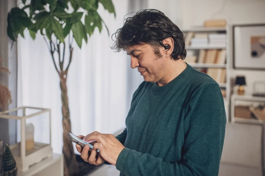 Man testing an app at home
