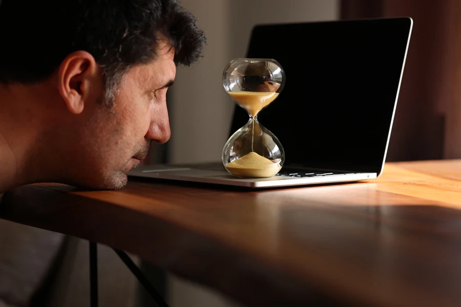 Man waiting for time to pass
