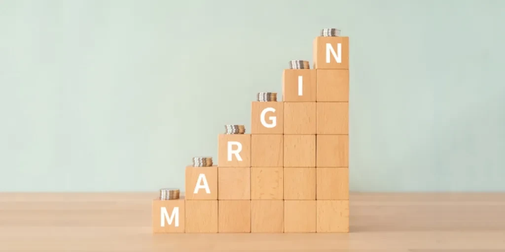 Margin on wooden blocks with coins