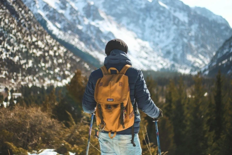 Men's Blue Leather Jacket and Brown Backpack