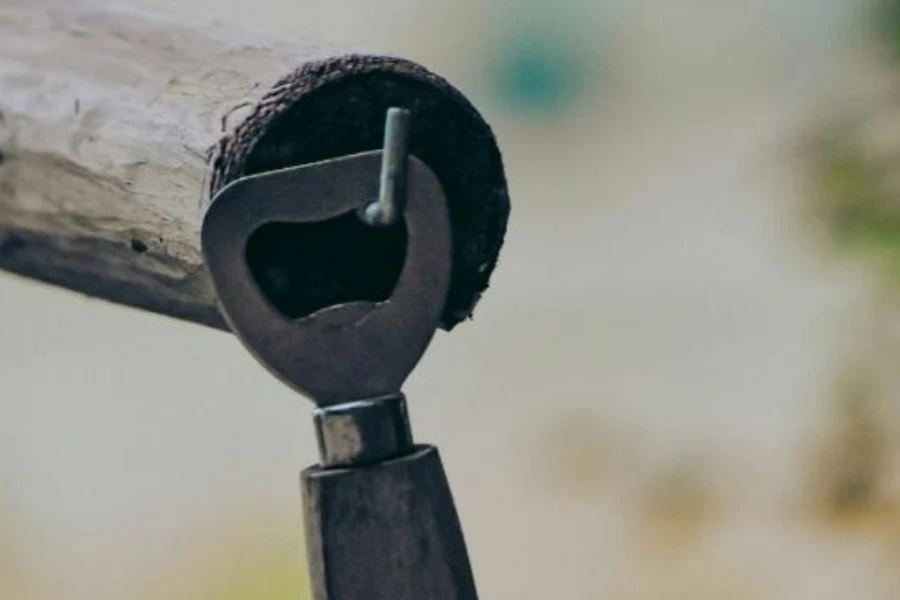 Metal speed bottle opener hanging on hook