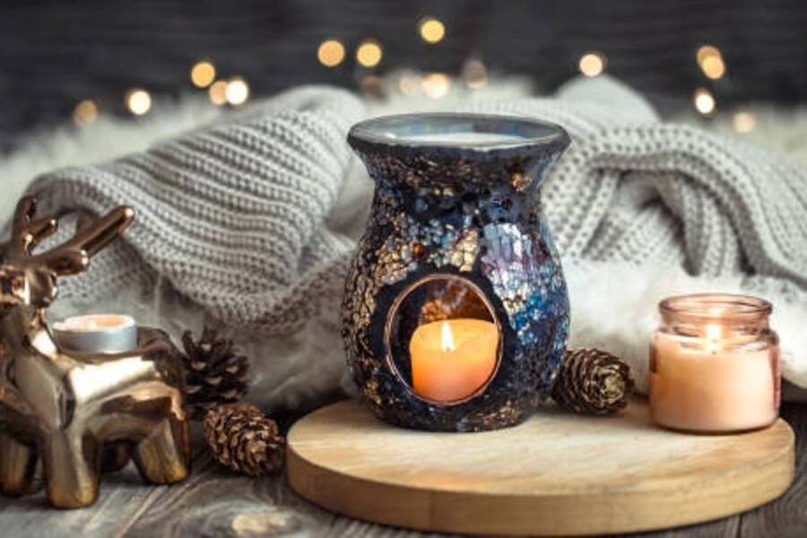 Multi-color ceramic and glass wax melter on wooden board