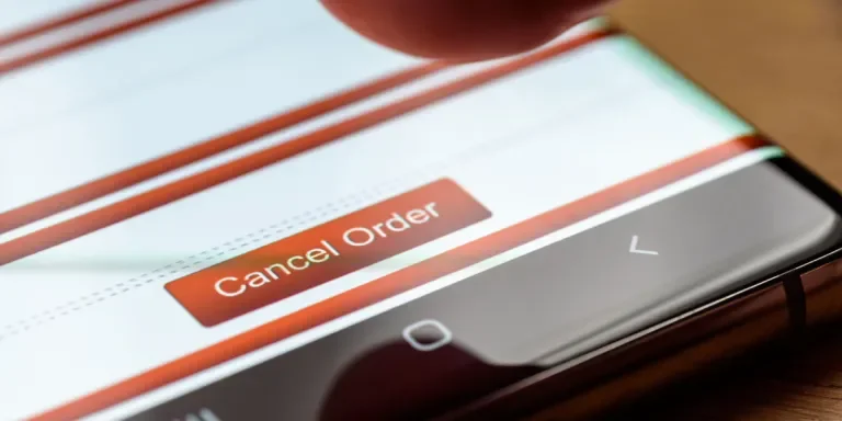 Person about to click a cancel order button