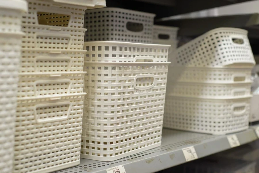 Plastic baskets lined up on shelves in a supermarket