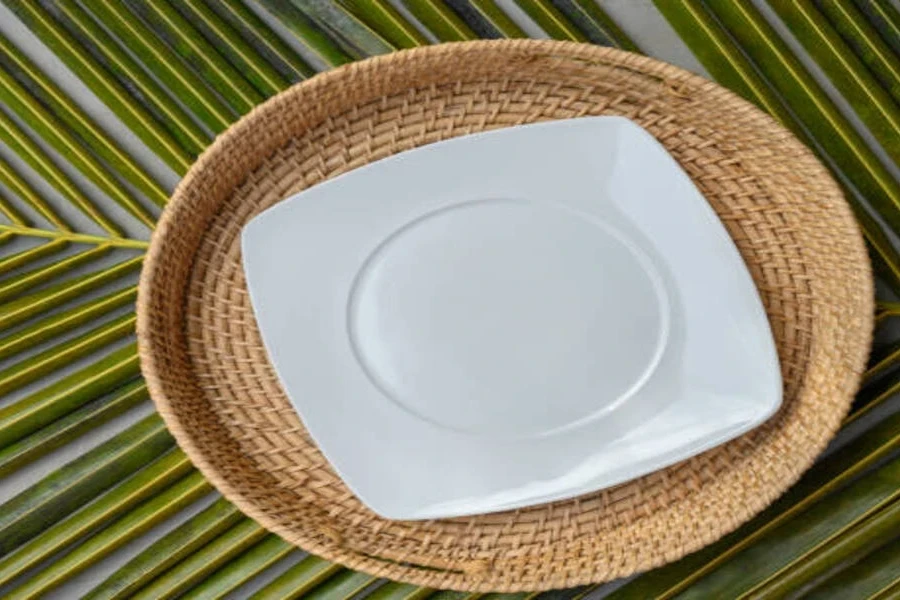 Rattan round charger plate with white ceramic plate on top
