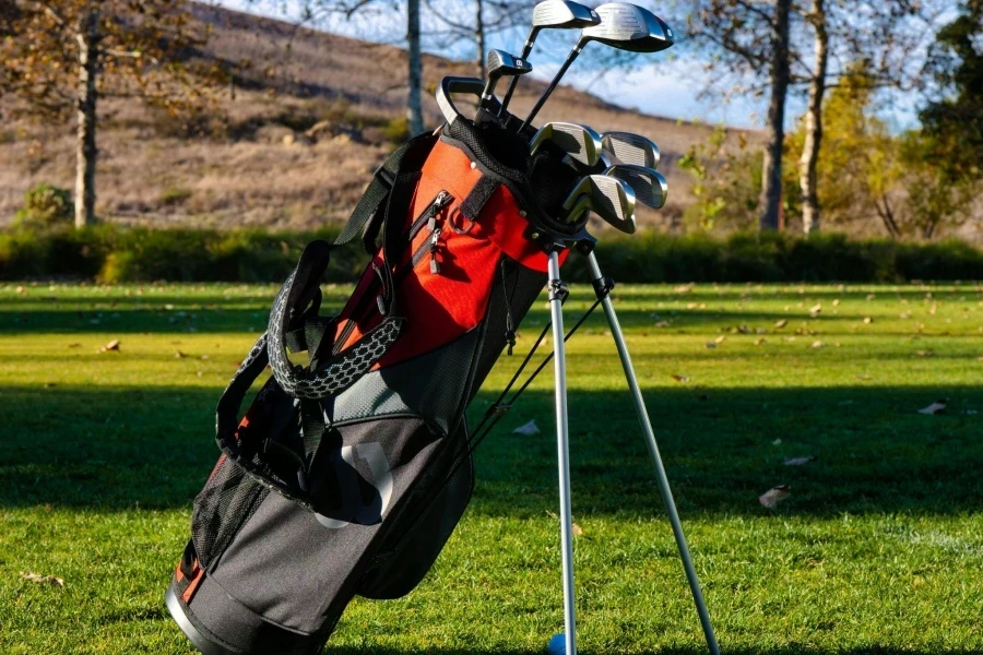 Red and Black Golf Bag on Grass