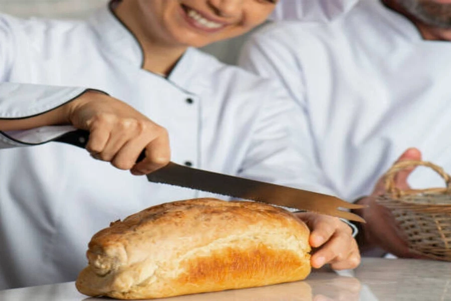 Stainless steel bread knife with 8-inch blade used by chef