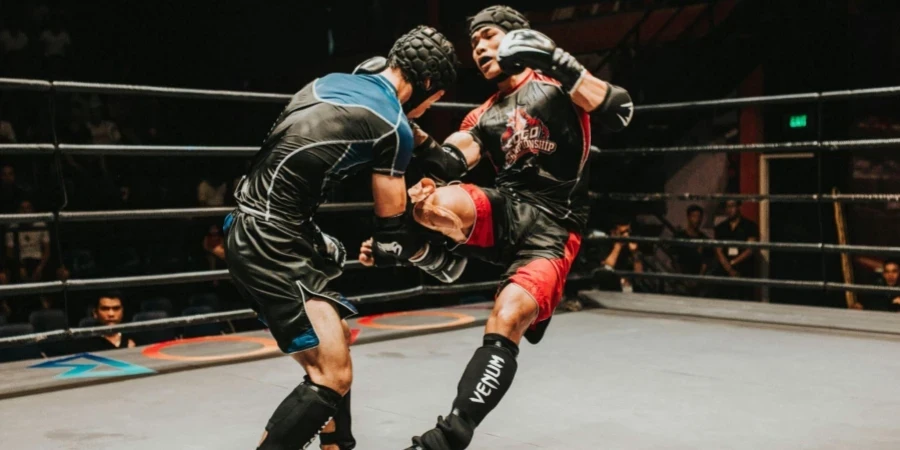 Two Fighter Fighting Inside Ring