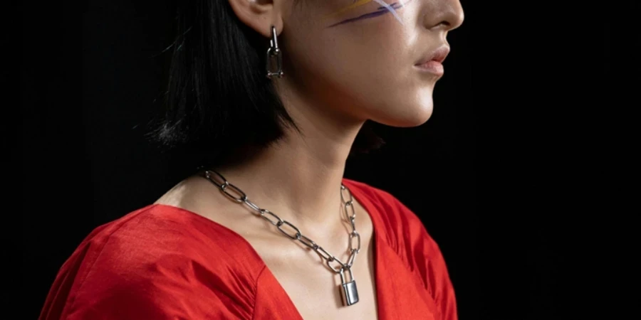Woman with Face Paint Wearing a Silver Chain Necklace