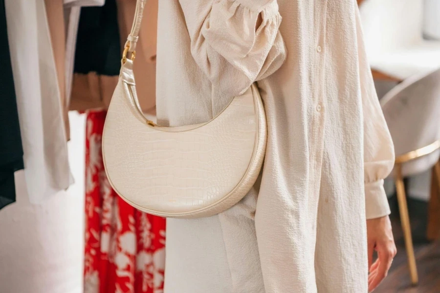 A Person with a White Shoulder Bag