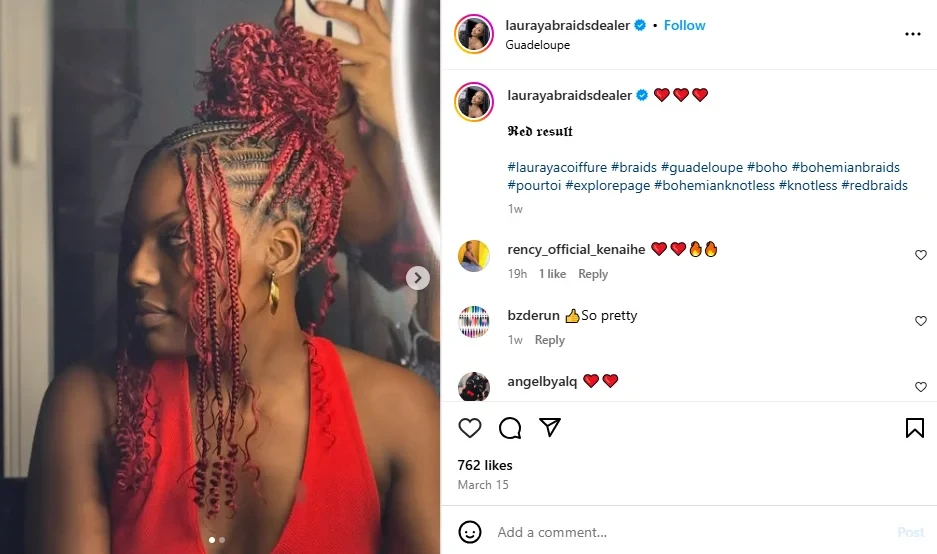 A beautiful woman showing off red braids