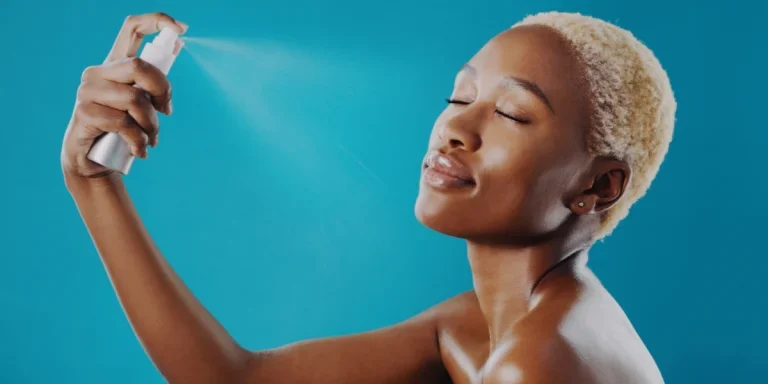 A beautiful woman using setting spray