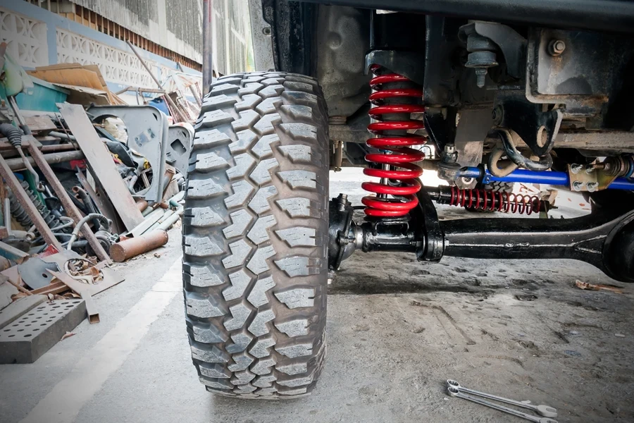 A car’s front wheel and suspension