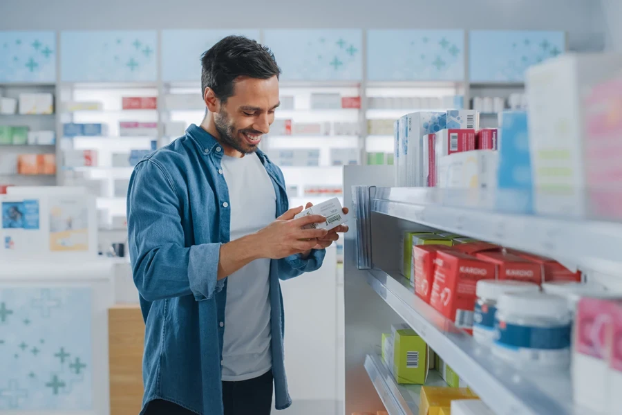 A man checking the price of a product