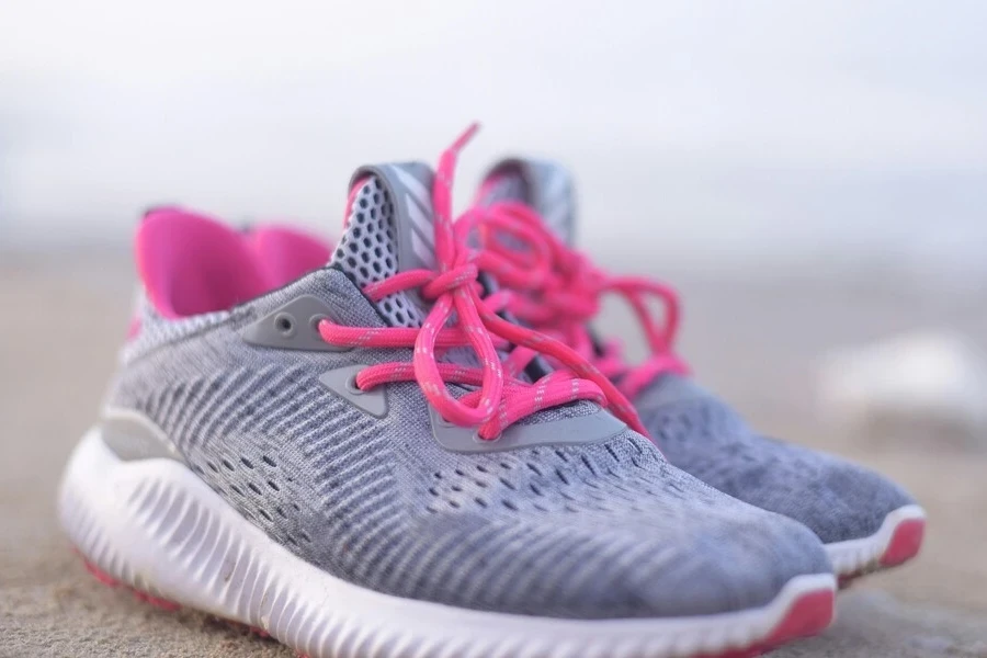 A pair of grey and pink sneakers