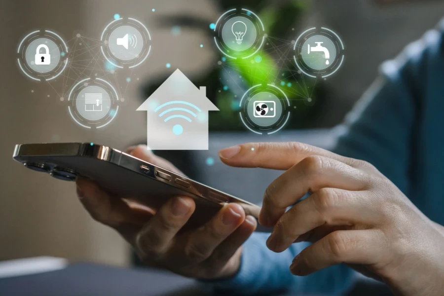 A person controlling a smart home through a phone