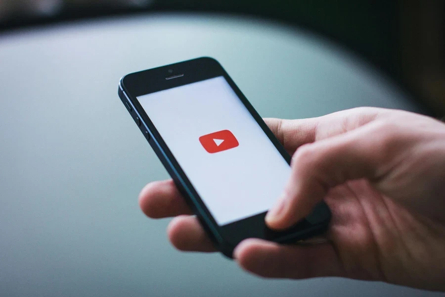 A phone with a YouTube icon