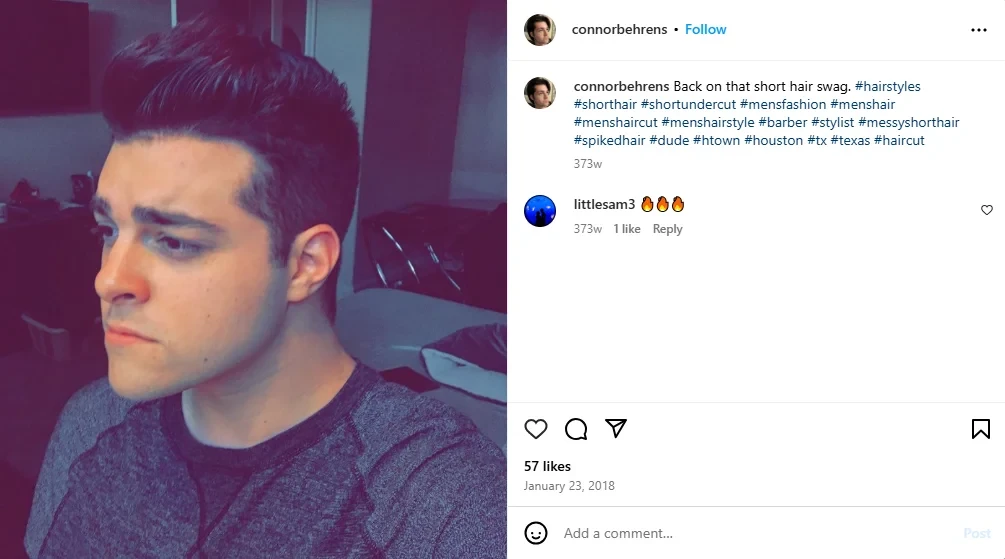 A screenshot of a man with a short undercut