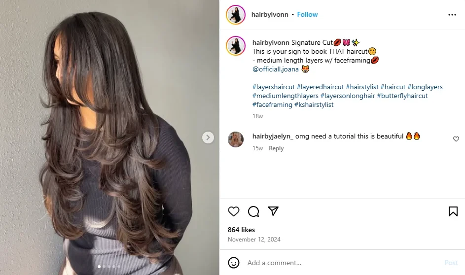 A screenshot of a woman with beautiful long layers