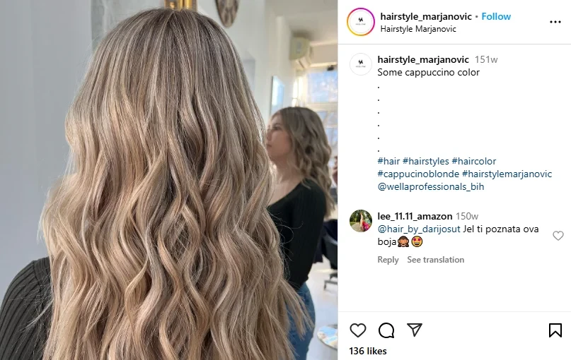 A screenshot of a woman with cappuccino blonde hair