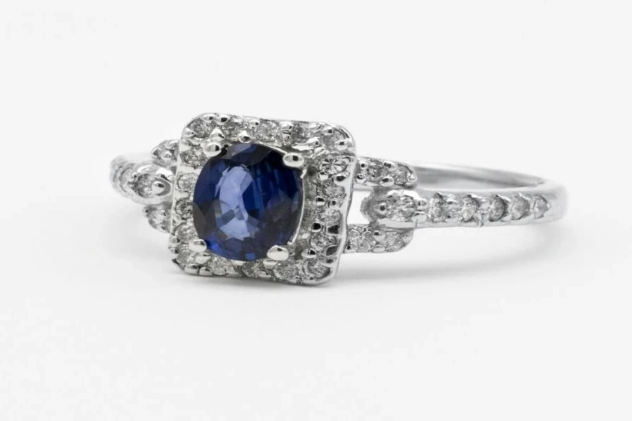 A silver ring with a blue gemstone