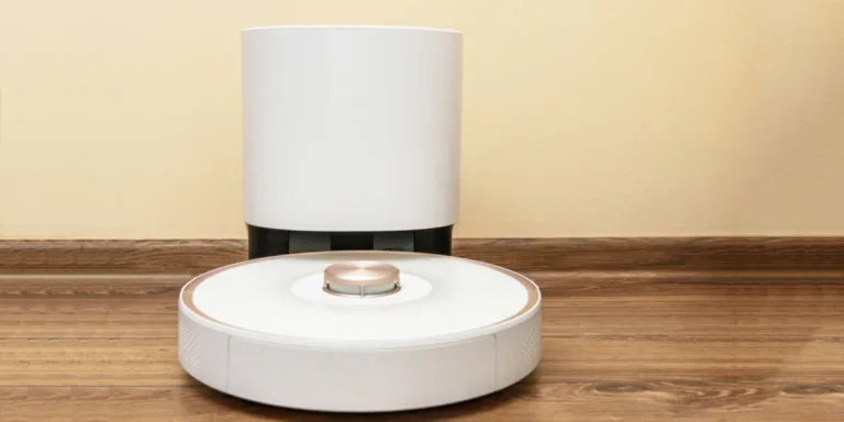 A smart vacuum cleaner returning to dock for auto-emptying
