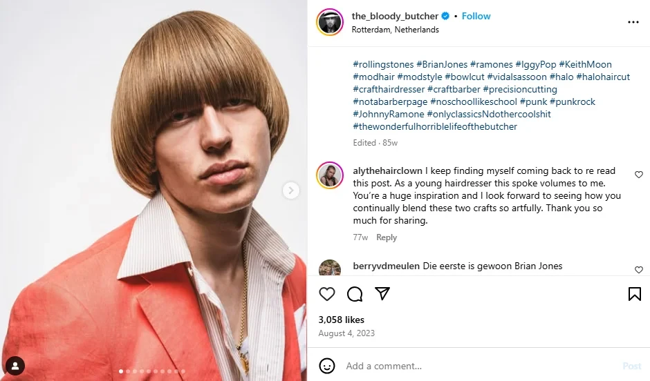 A stylist showing off his bowl cut