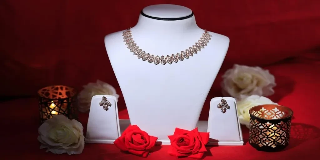 A white mannequin with jewelry on it