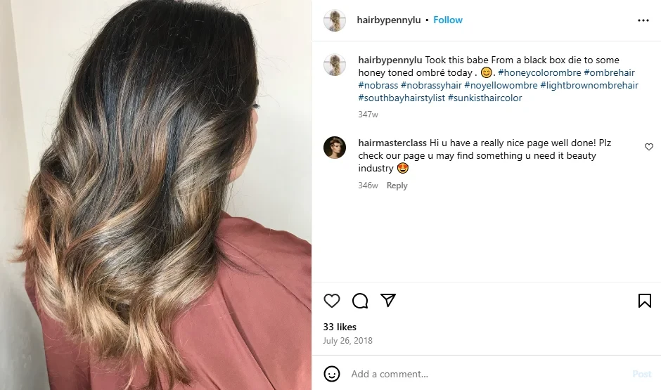 A woman showing off her light brown ombre hair