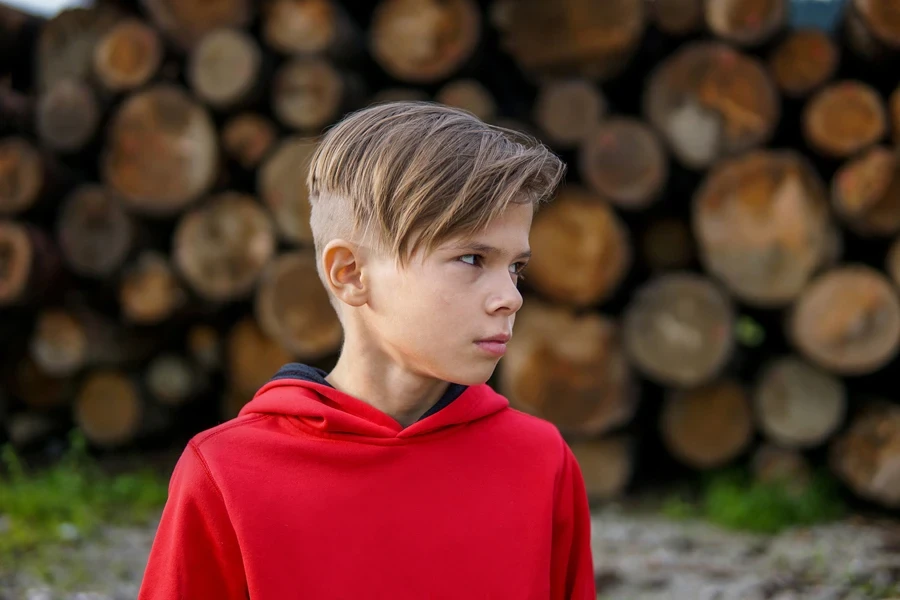 A young boy with a trendy undercut
