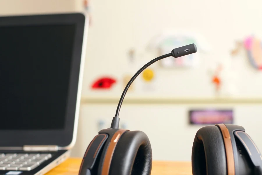 Black and brown headset near a laptop