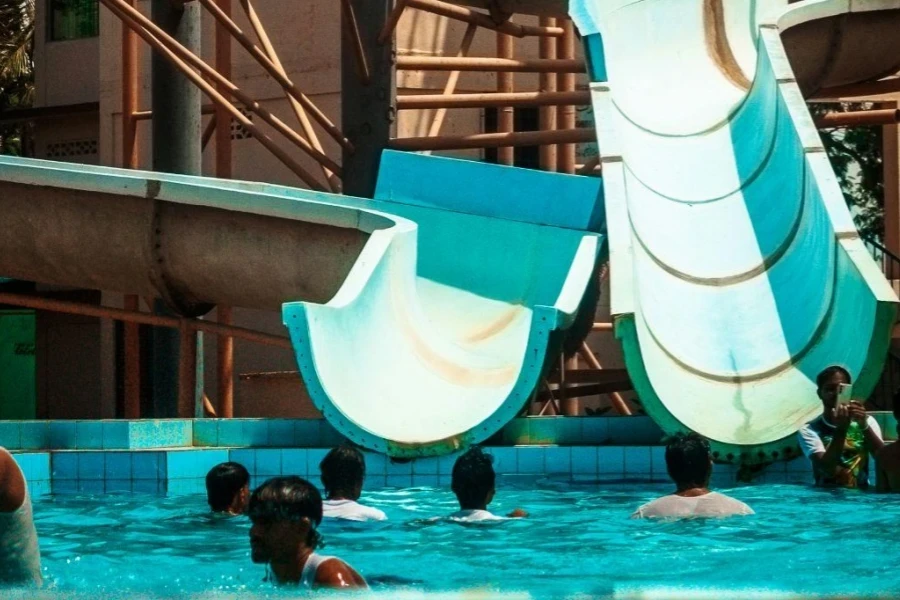 Blue above-ground pool slides at the swimming pool