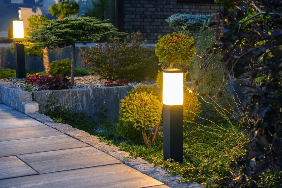 Bollard light in residential backyard garden