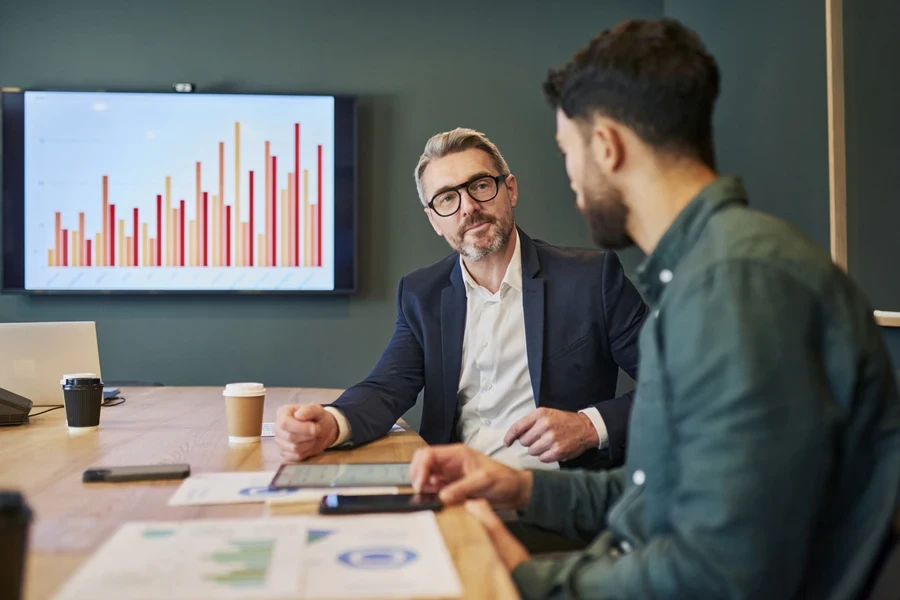 Businessmen negotiating for customer acquisition