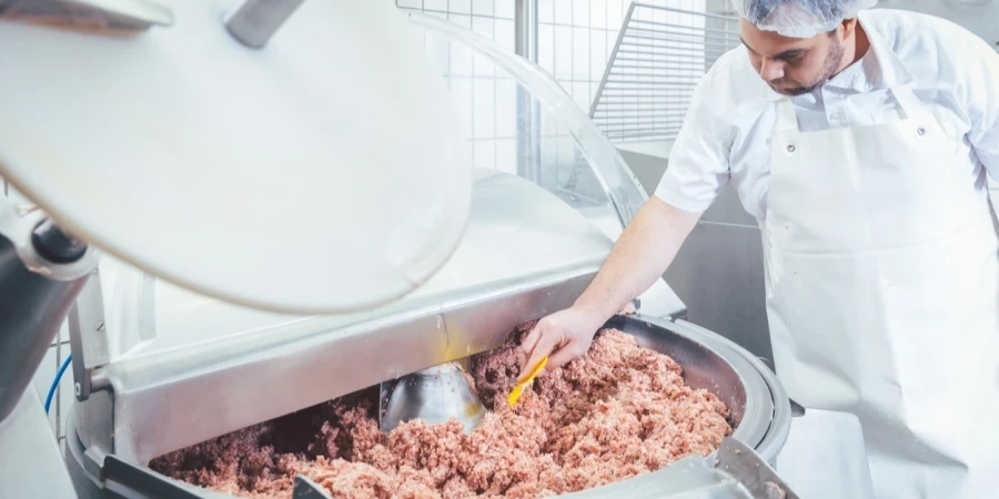 Butcher Checking Minced Meat