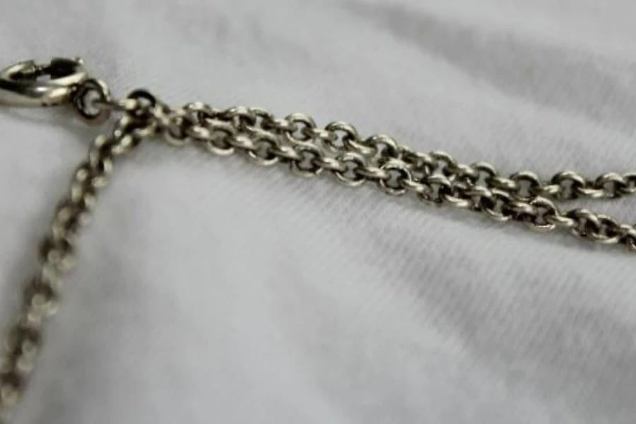 Close up of silver multilayer chain belt
