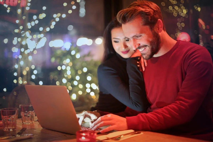 Couple working on a laptop