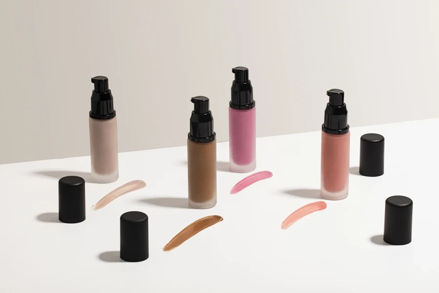 Different liquid foundations on a white table