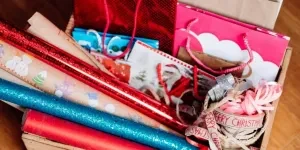 Gift wrapping paper rolls inside box