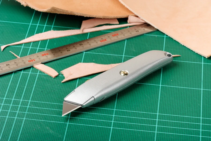 Heavy utility knife used to cut paper for crafting