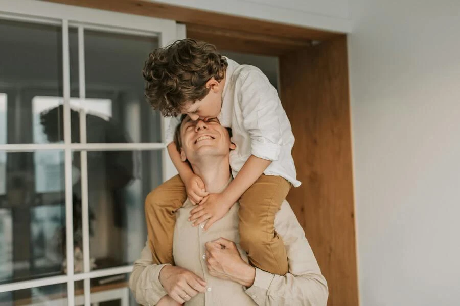 Man Carrying his Son on his Shoulders